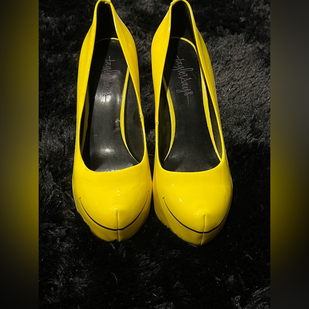 Taylor says designer heels